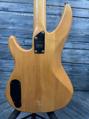 Wooden guitar body on a wooden surface