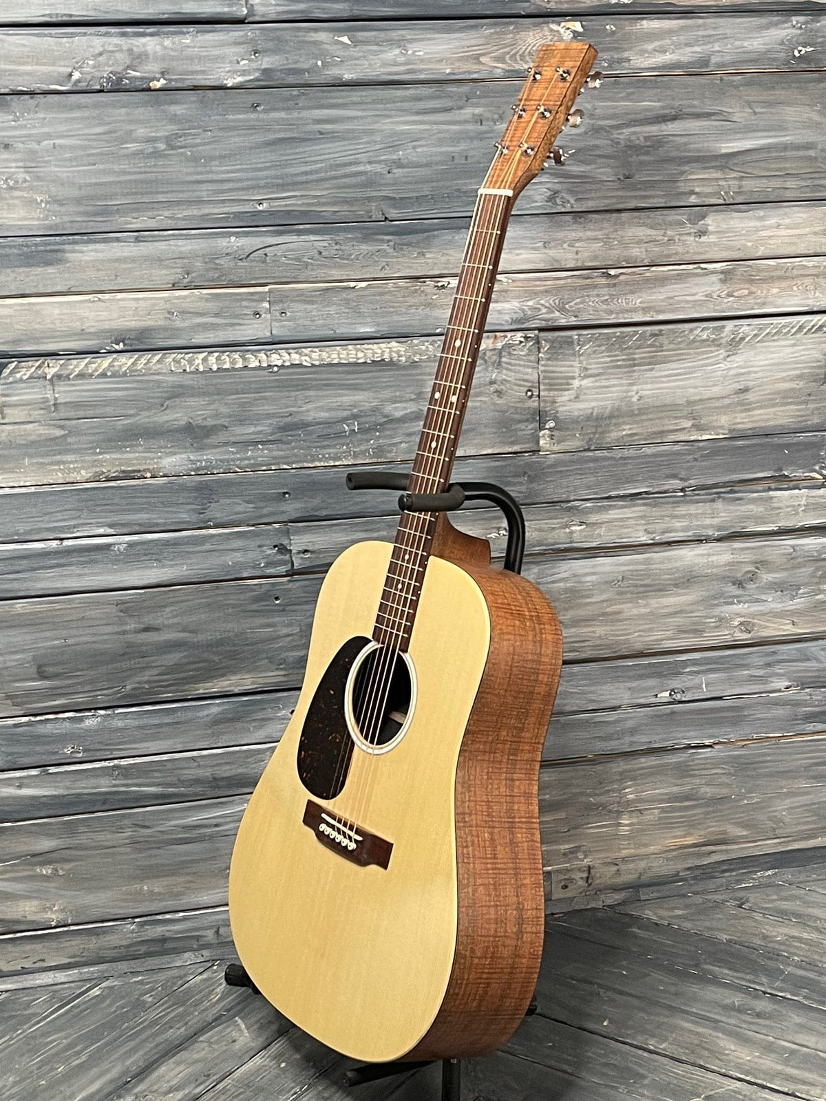 Martin Left Handed D-X2E full bass side view of guitar