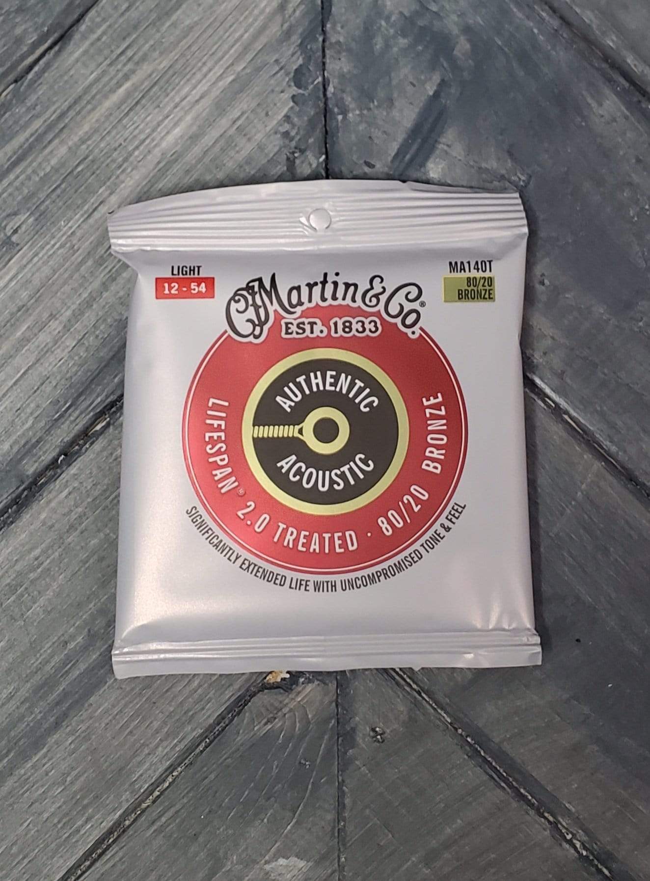 Martin MA140T Authentic Acoustic Lifespan 2.0 80/20 Bronze front of packaging