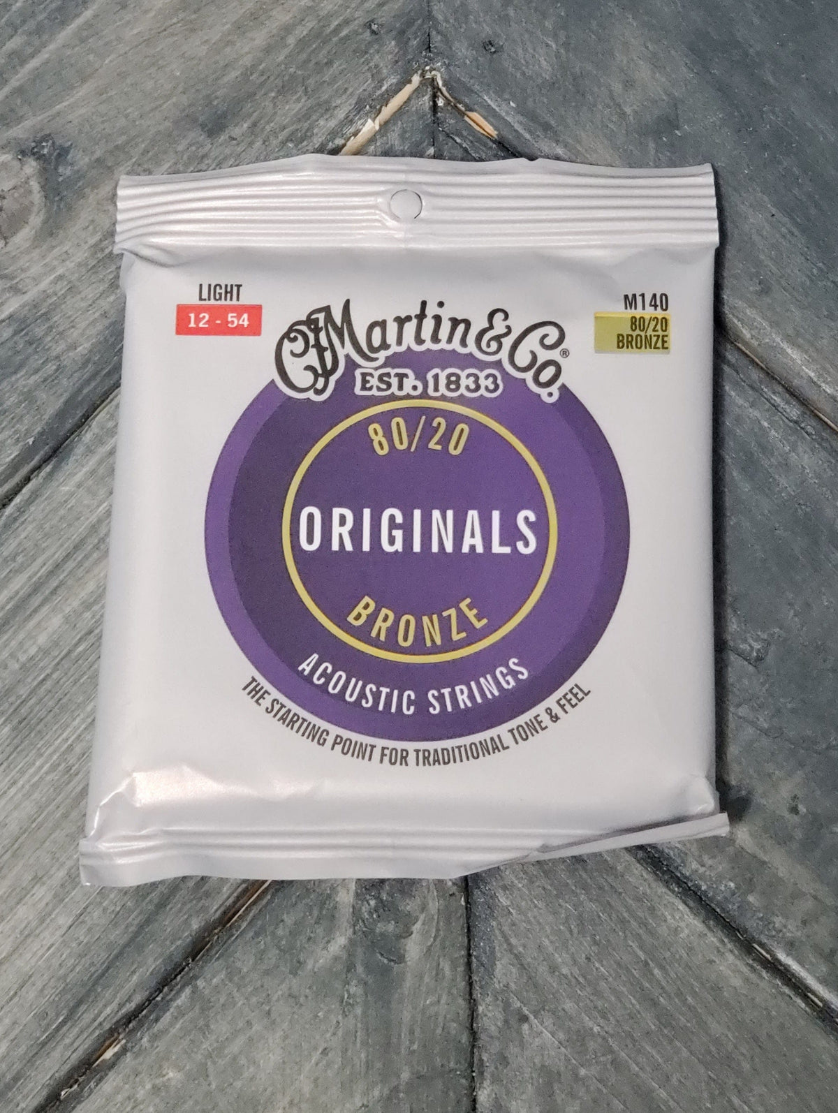 Martin M140 Original Acoustic 80/20 Bronze Guitar Strings front of packaging