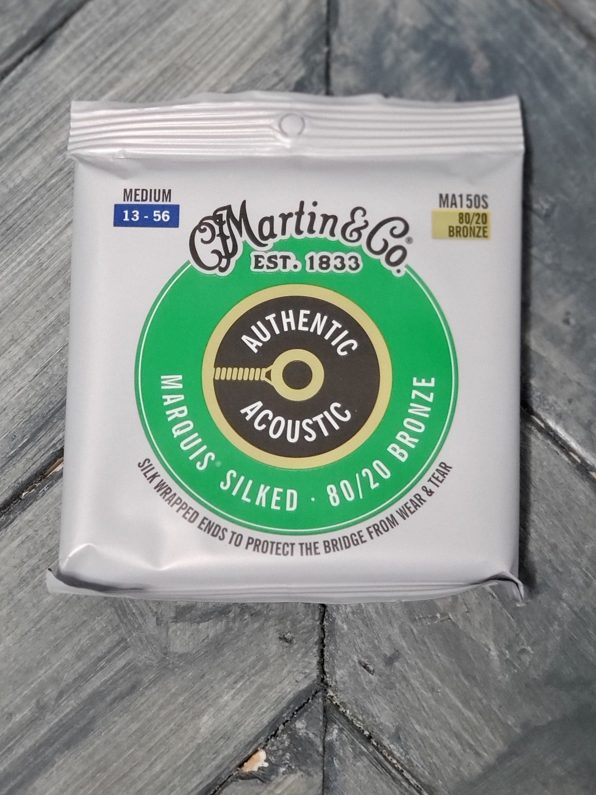 Martin MA150S Authentic Acoustic Marquis Silked 80/20 Bronze front of packaging 