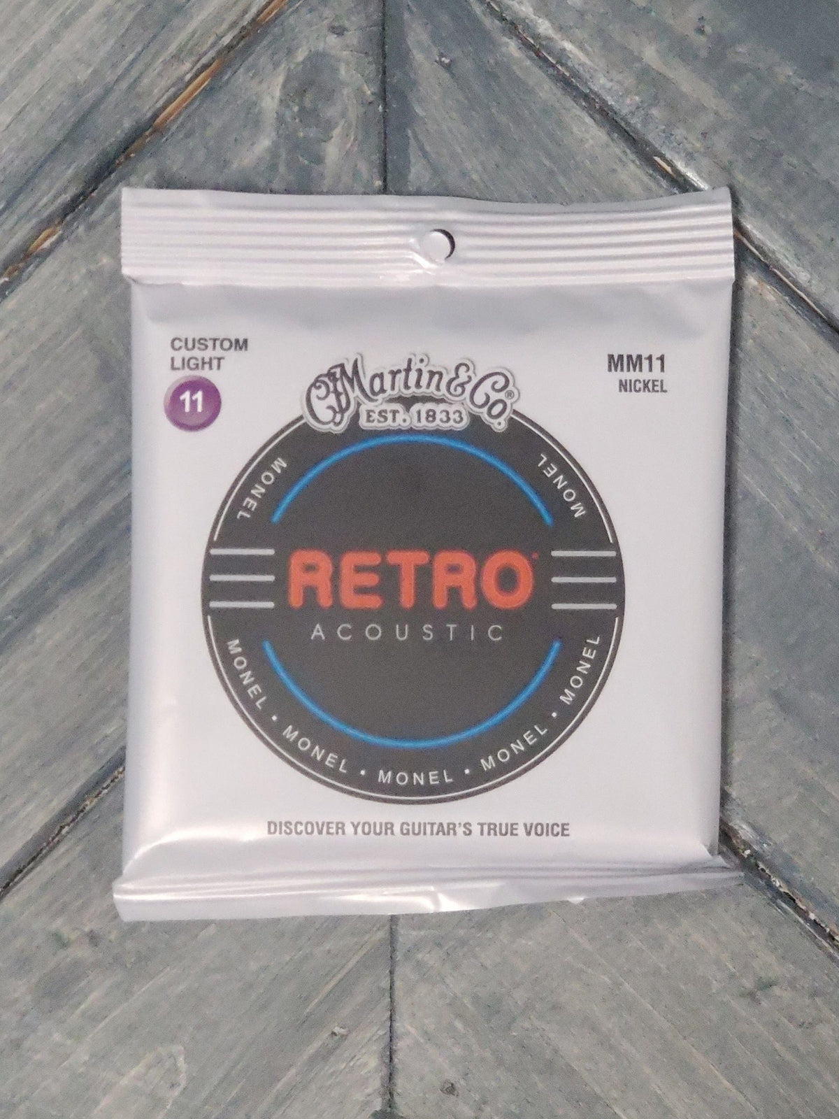 Martin MM11 Custom Light Monel Acoustic Guitar Strings front of packaging