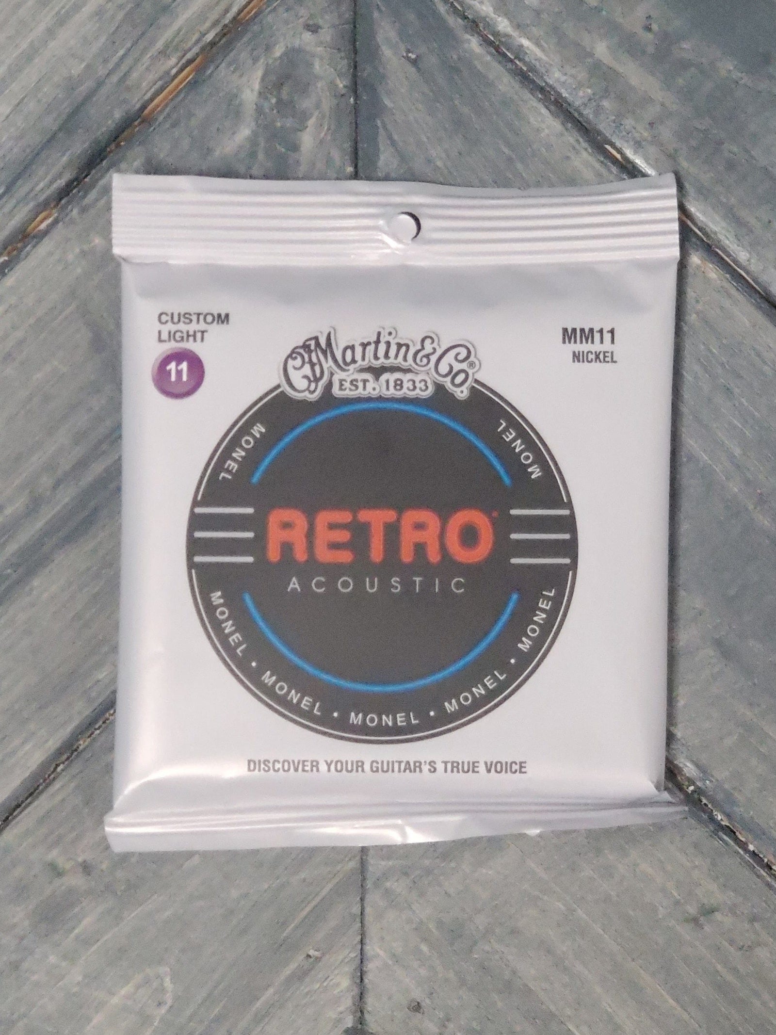 Martin MM11 Custom Light Monel Acoustic Guitar Strings front of packaging