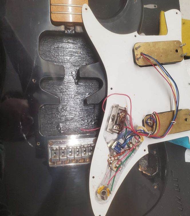 Used Lotus 80's MIJ HH Strat back of the pickguard